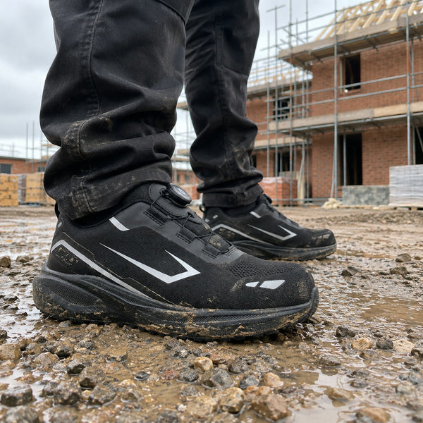 IconWorker Drift S3 safety shoes on a muddy building site